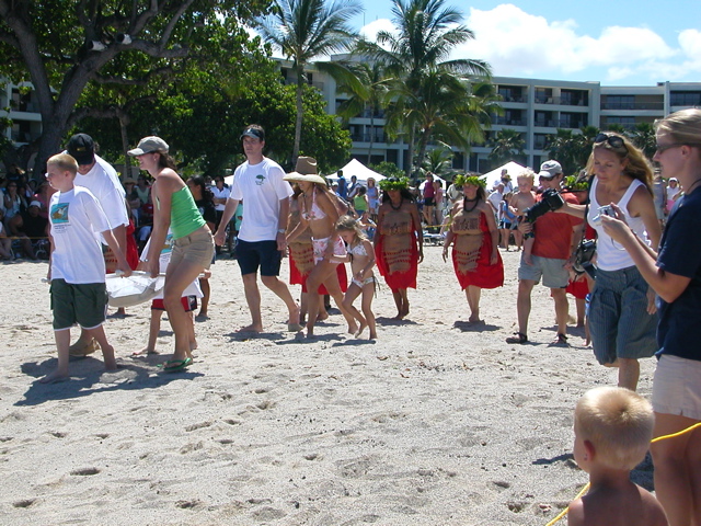 Accompanied by a Hula Halau